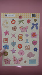 Planche de stickers illustrés Nany Craft Shop avec papillons fleurs fruits nœuds étoiles cassette et motifs colorés pour journaling et papeterie