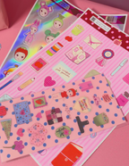 Feuilles de scrap rose avec personnages, stickers et décorations pour loisirs créatifs