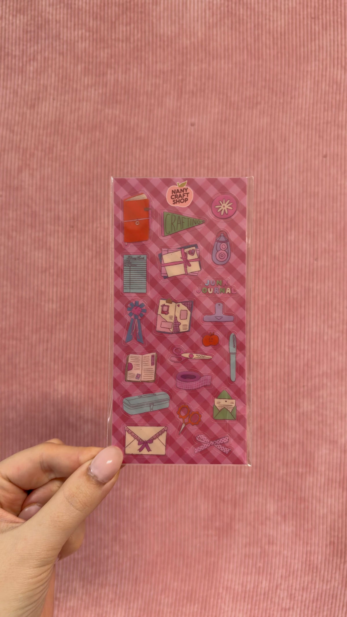 Planche transparente de stickers décoratifs pour journaling et papeterie avec motifs créatifs colorés tenue à la main par Nany Craft Shop